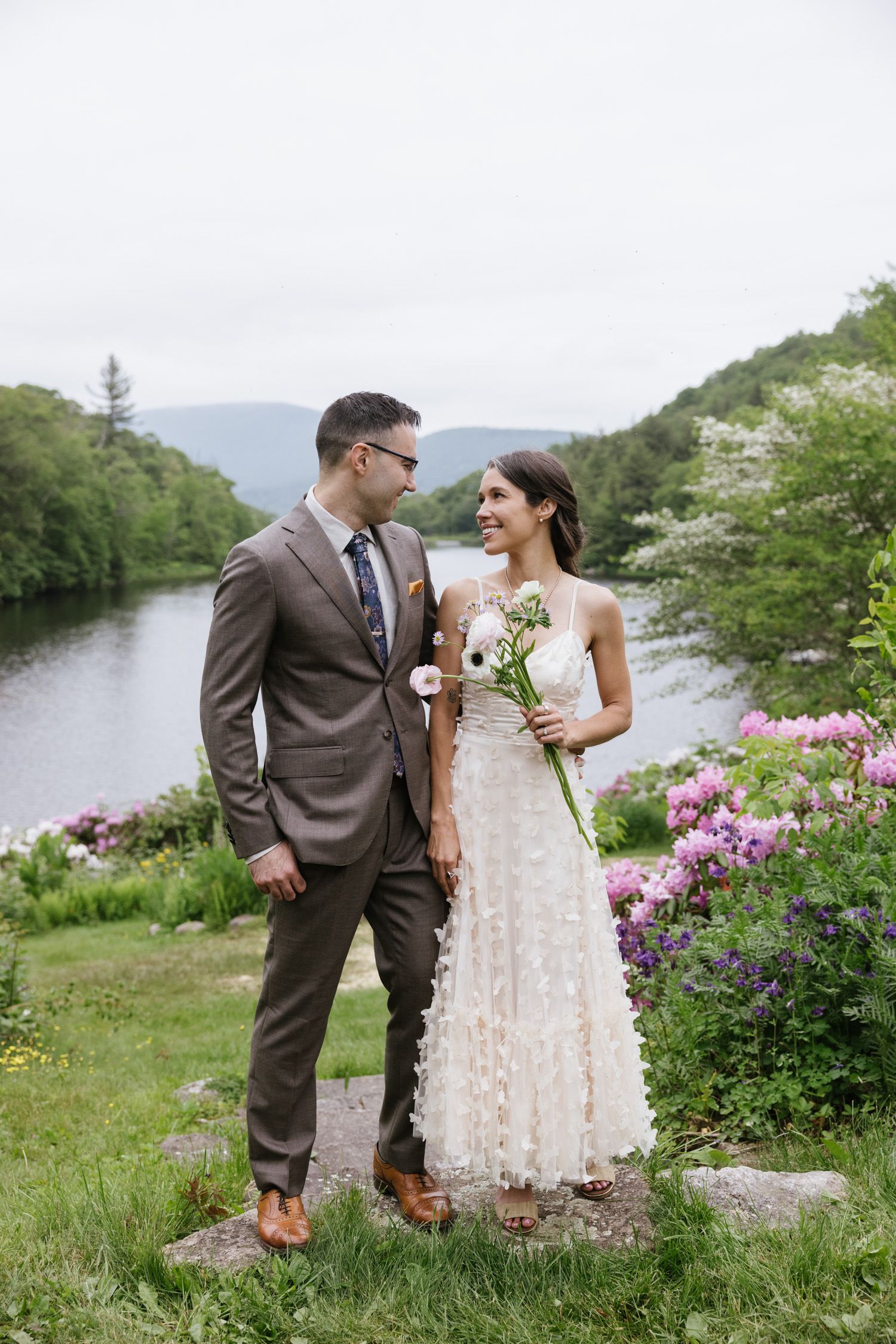 Couple looking at each other at their family home in the Hudson Valley