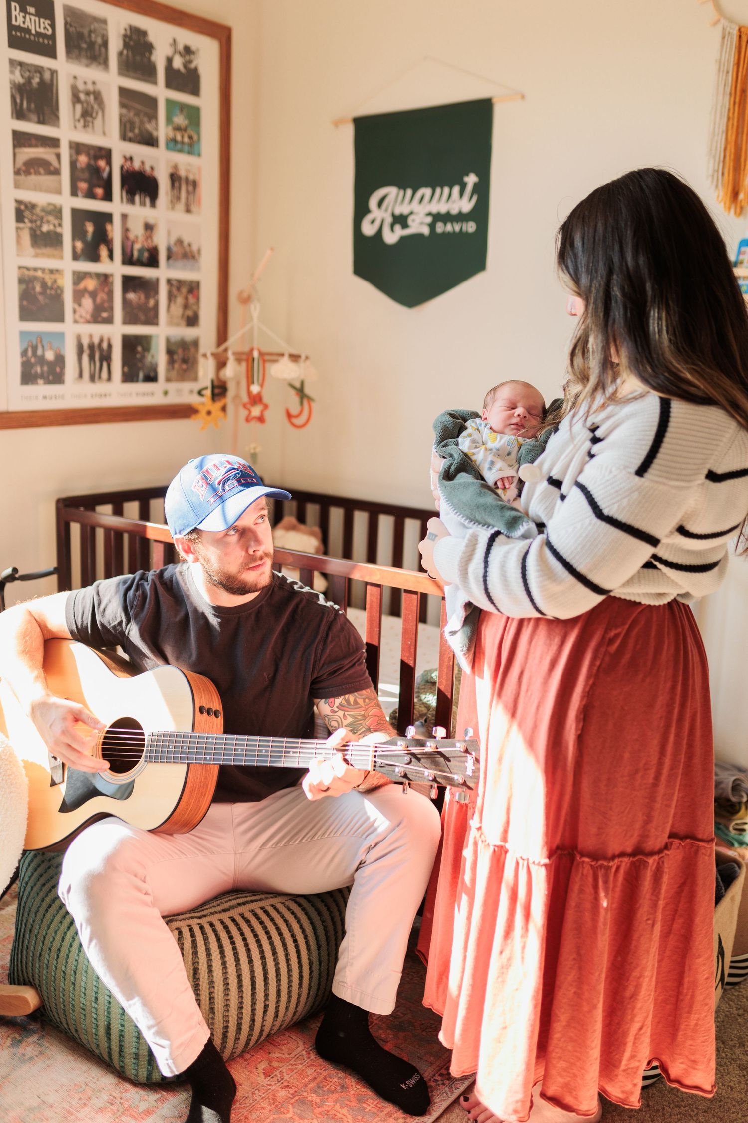 A cozy nursery scene with guitar music and family bonding.

Rochester NY wedding photographer