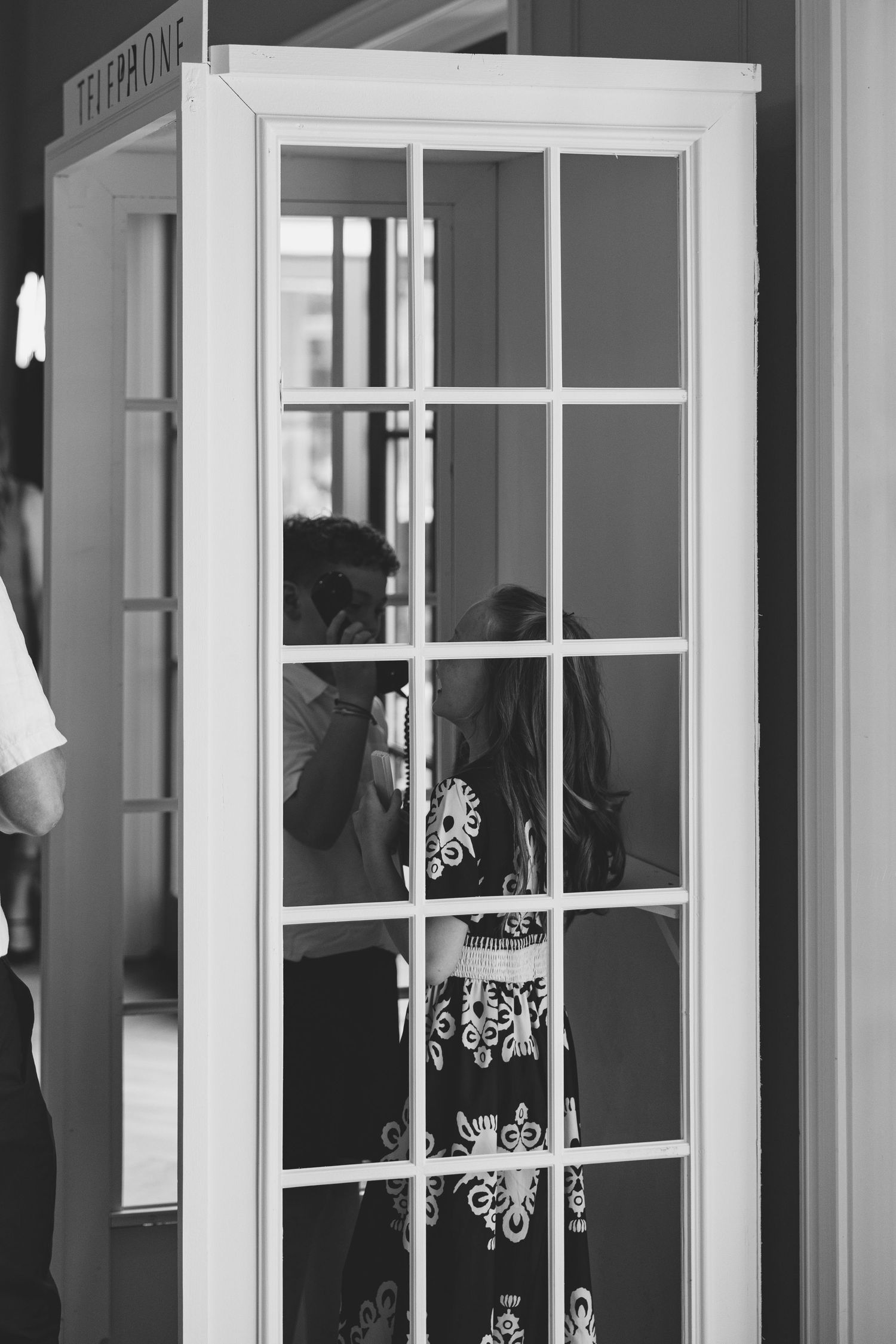 Black and white architectural detail of French doors with decorative window panes. Separk Mansion Wedding Photographer