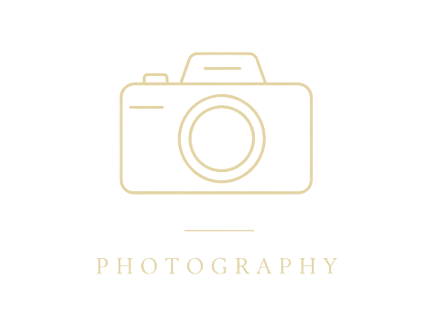 Elegant gold outline camera logo with Photography text, minimalist luxury photography brand icon on white background.