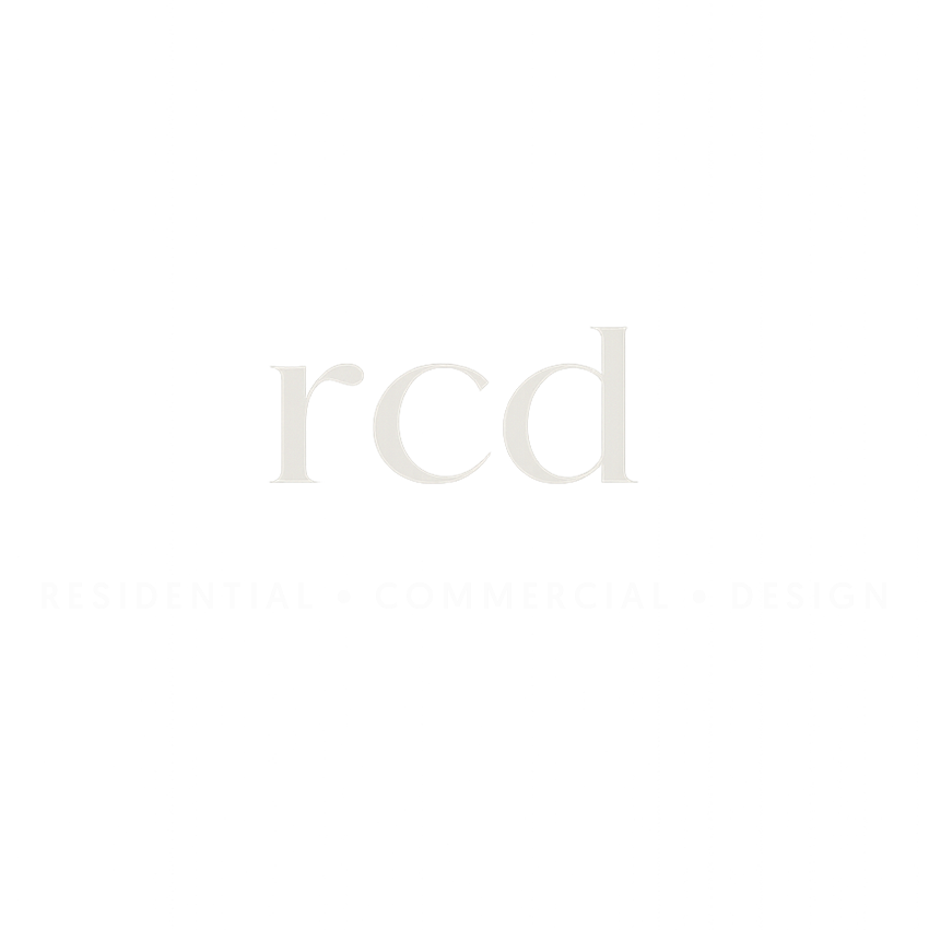 Minimalist RCD logo in light gray serif font on white background.