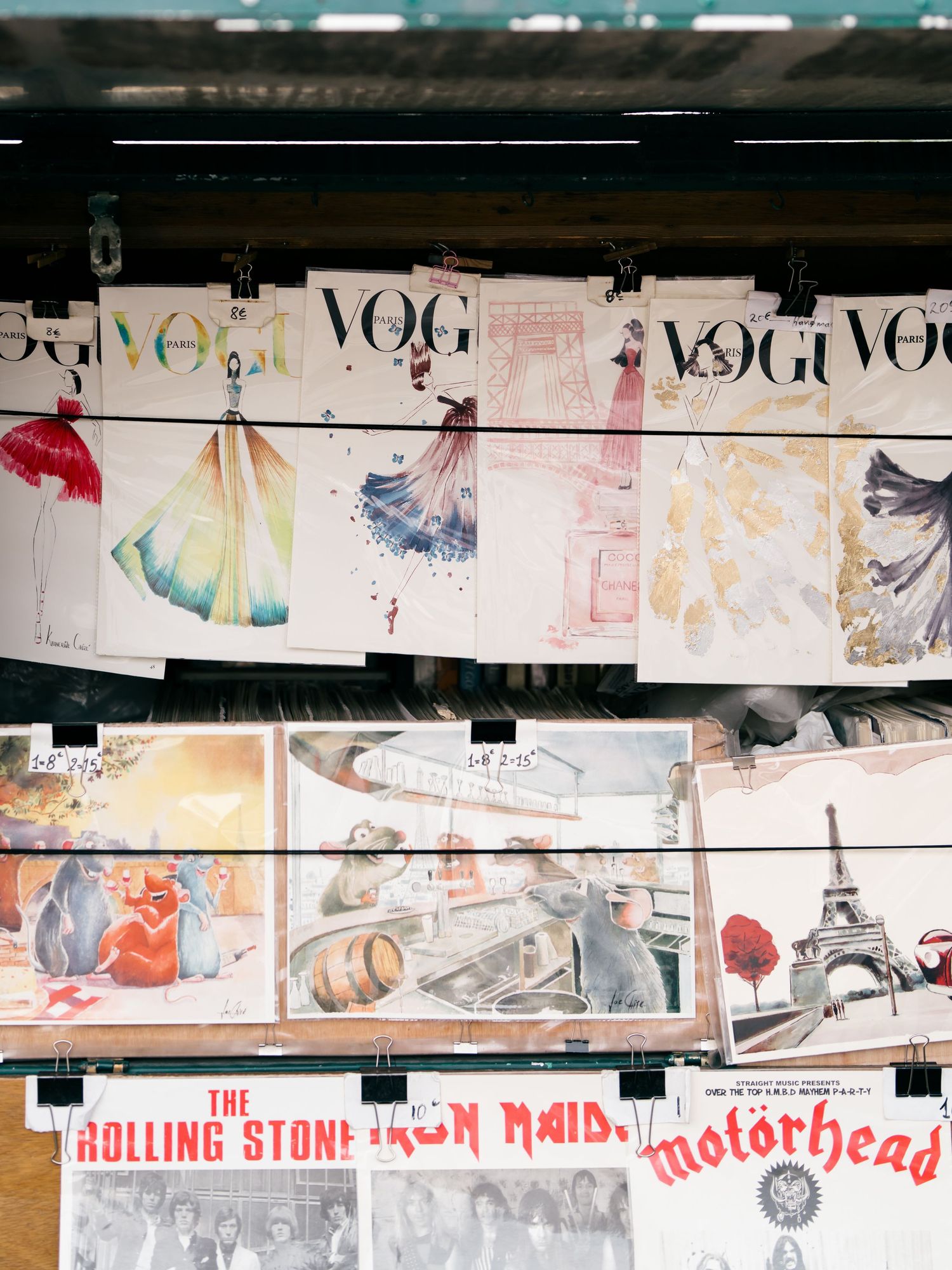 Collage of Vogue vintage magazine covers and fashion illustrations arranged in a horizontal layout. Paris, France art.