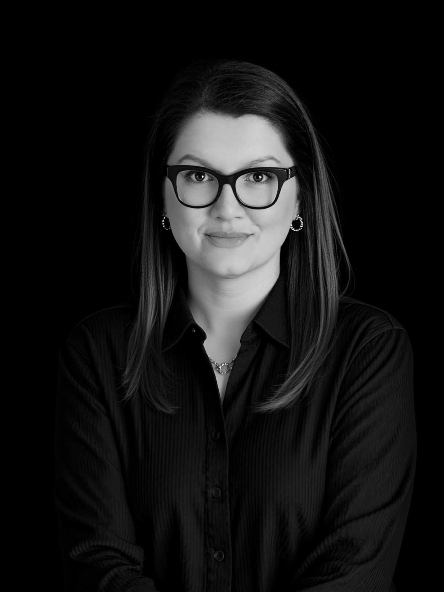 Professional black and white portrait of Jessica Blackburn Photography. Jessica photographs luxury weddings & fashion around the world.