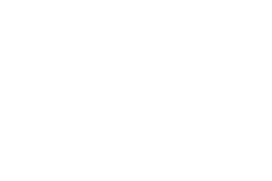 Minimalist black background with subtle lighting creating atmospheric shadows.