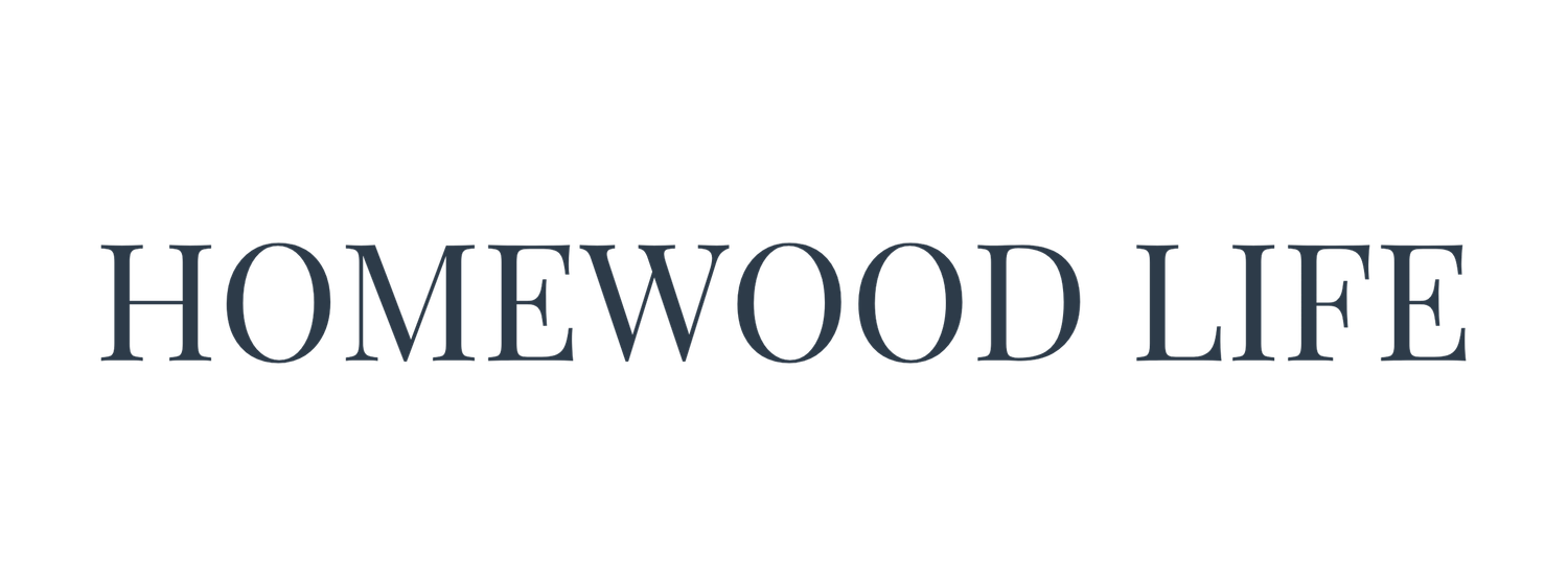 Homewood Life magazine logo in dark navy elegant serif font on white background.