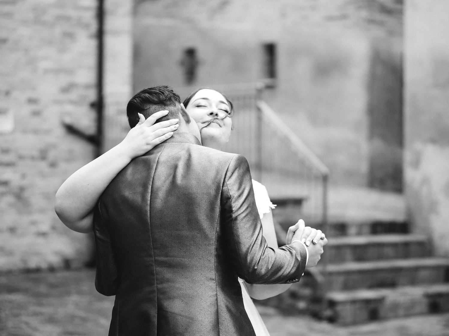 Bride and groom dancing together during an intimate destination wedding in Italy