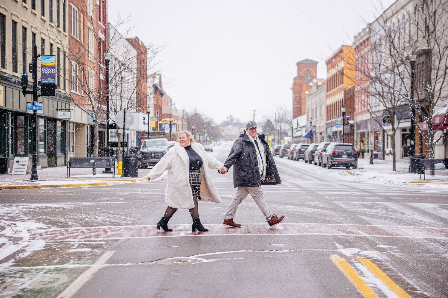 engaged couple walking together during Michigan engagement photos