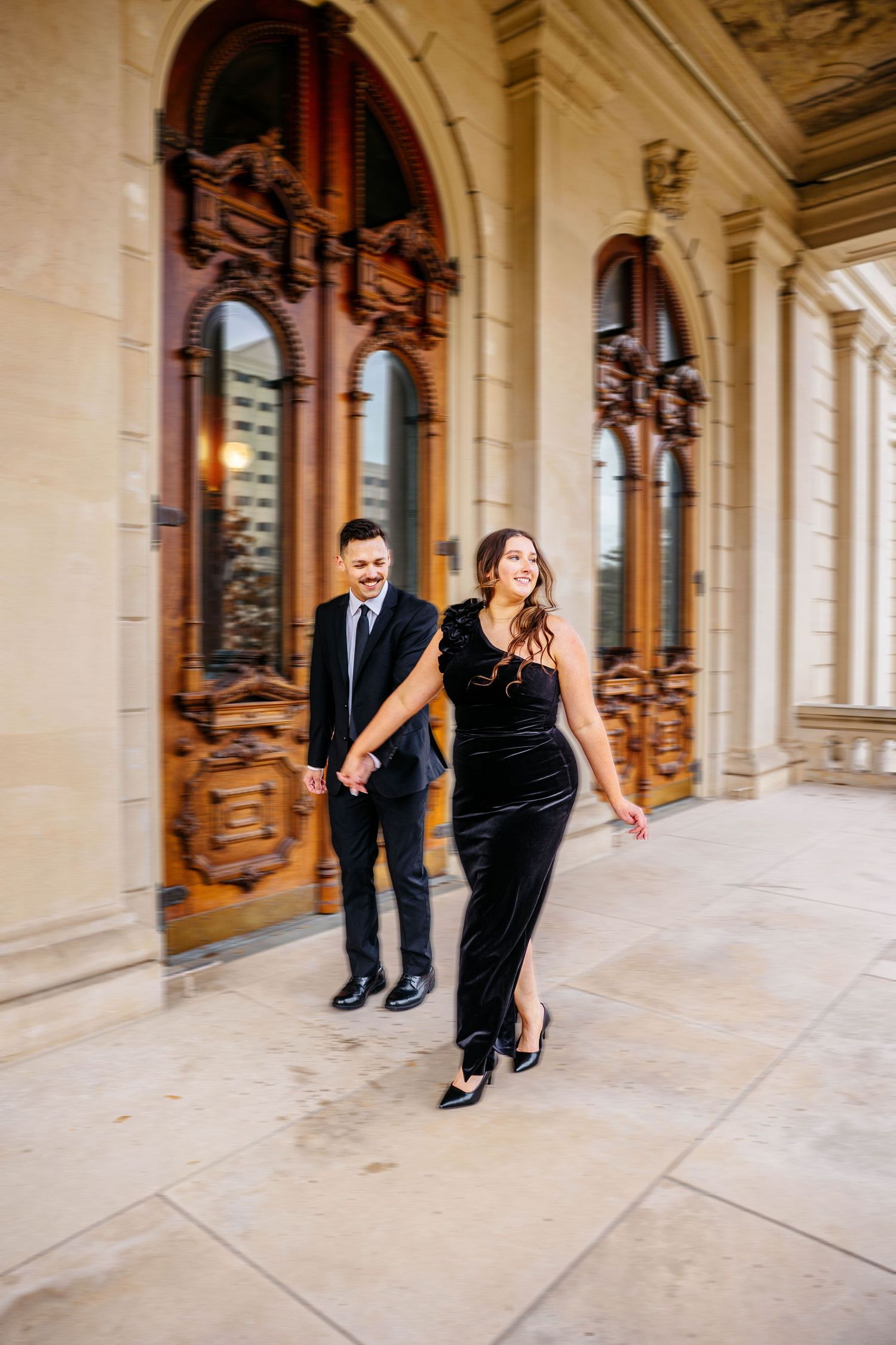 engaged couple walking together during Michigan engagement photos
