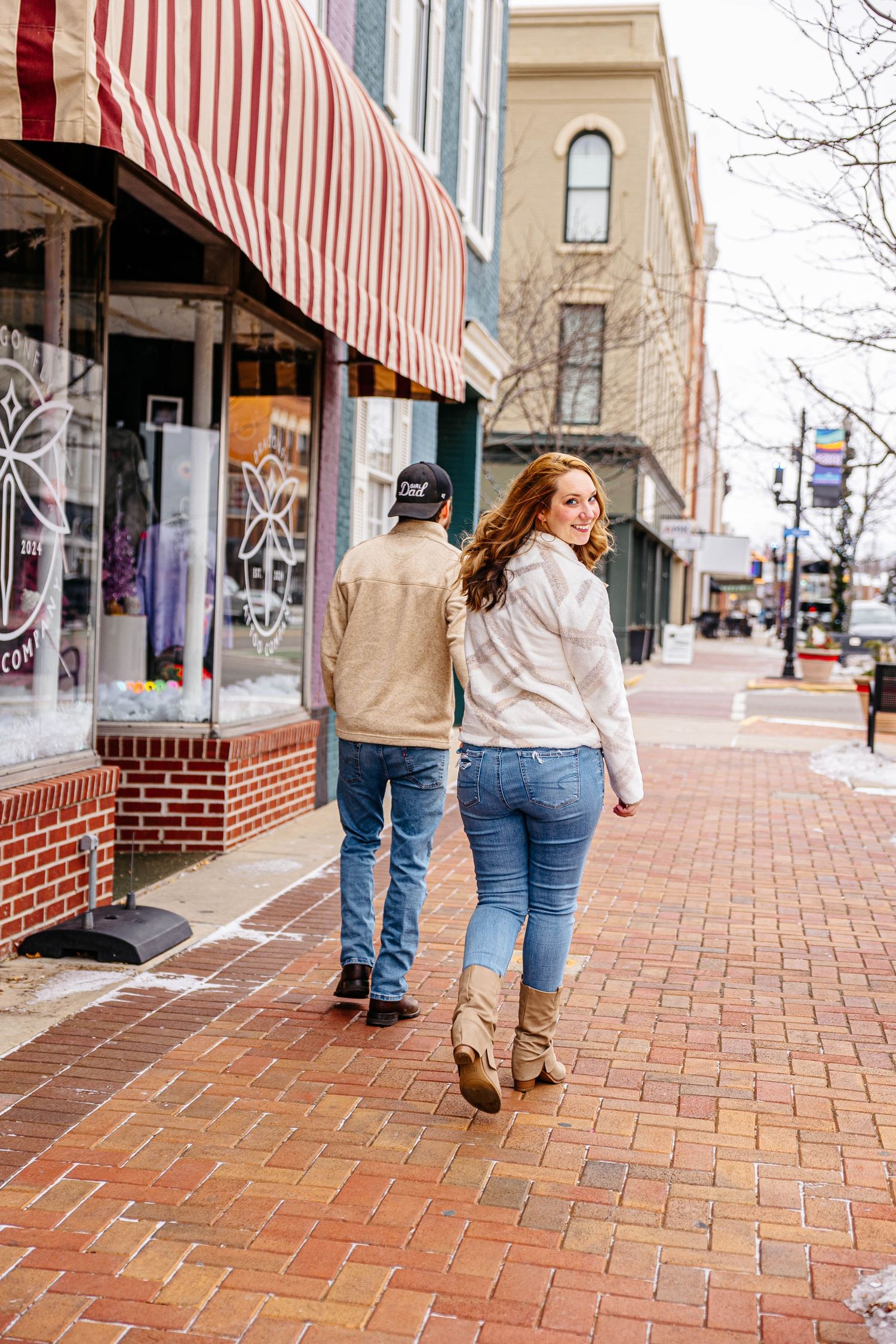 engaged couple walking together during Michigan engagement photos