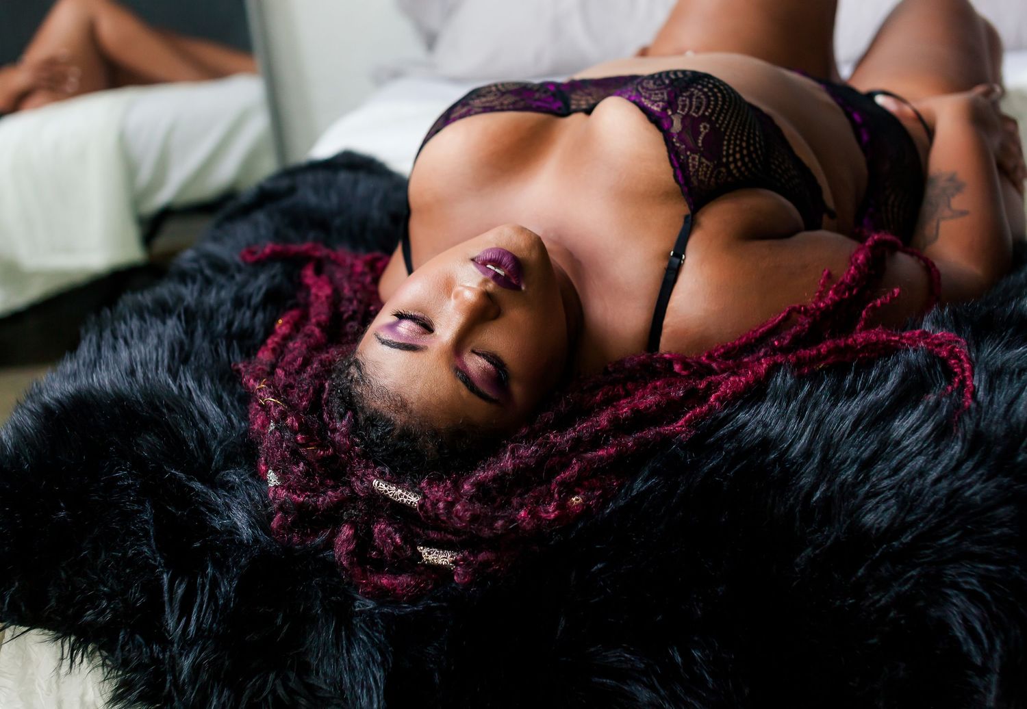 Luxury boudoir photography session in Bartlesville Oklahoma designed to celebrate confidence and feminine strength.