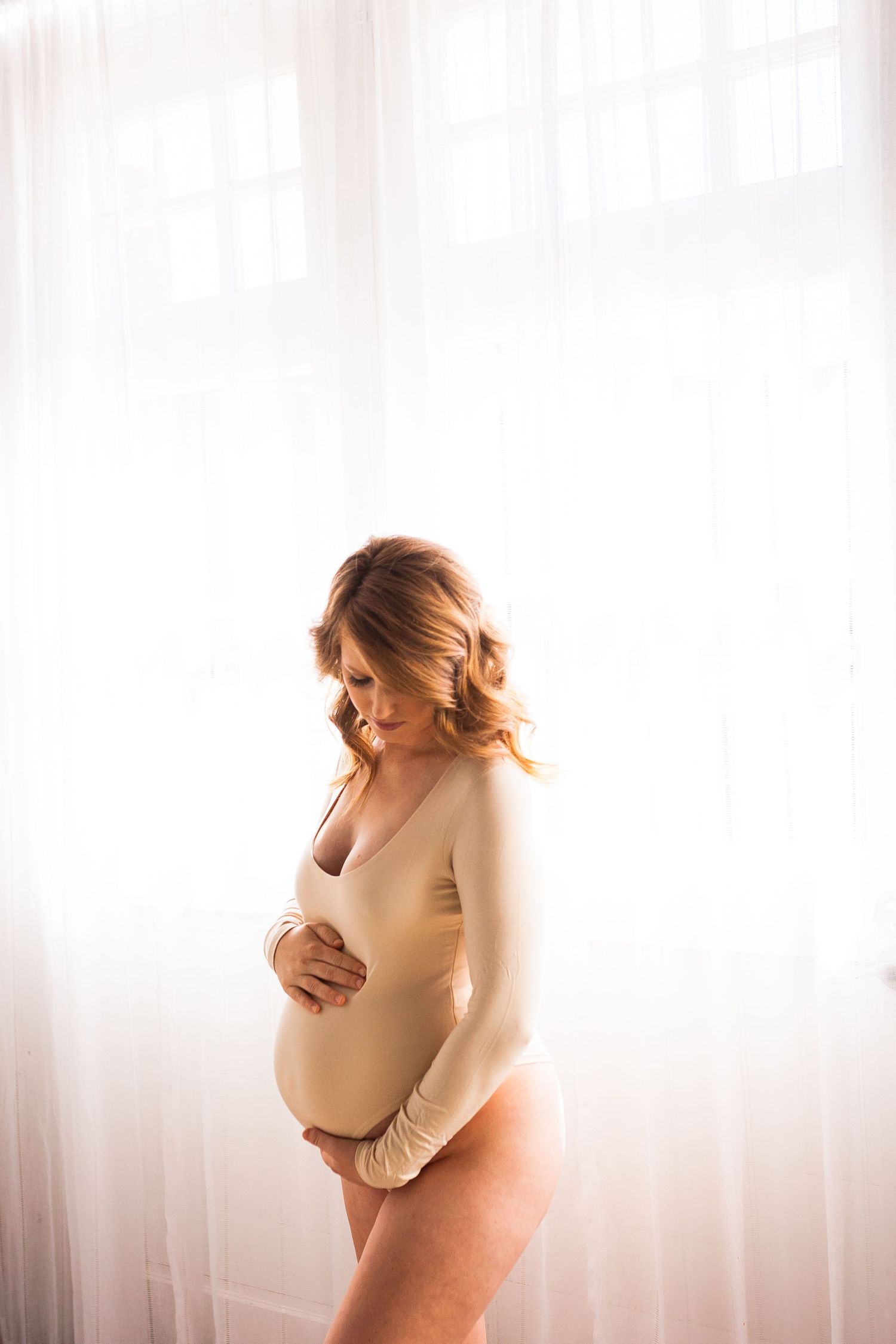 Luxury maternity portrait session in Tulsa Oklahoma capturing natural light, elegance, and imagery for who you are becoming.