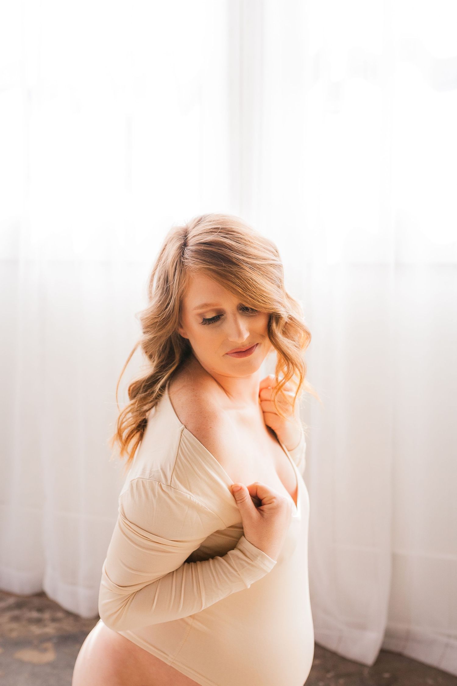 Luxury maternity portrait session in Tulsa Oklahoma capturing natural light, elegance, and imagery for who you are becoming.