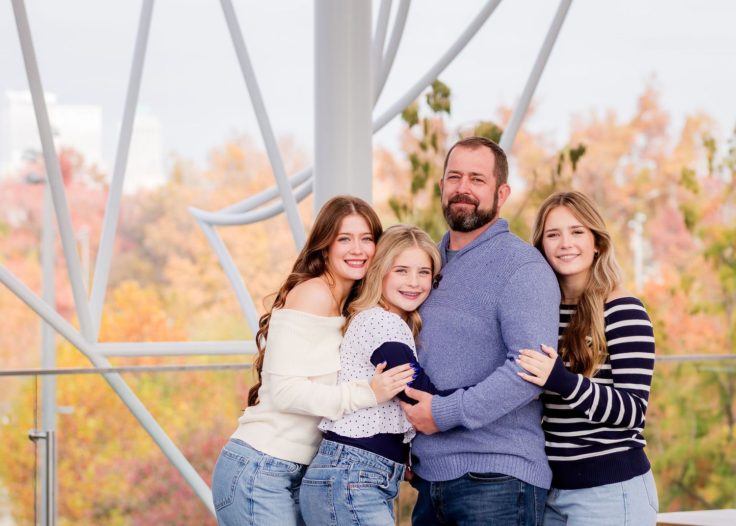 Family photography in Bartlesville Oklahoma featuring natural light and rFamily photography in Bartlesville Oklahomaefined portrait styling.