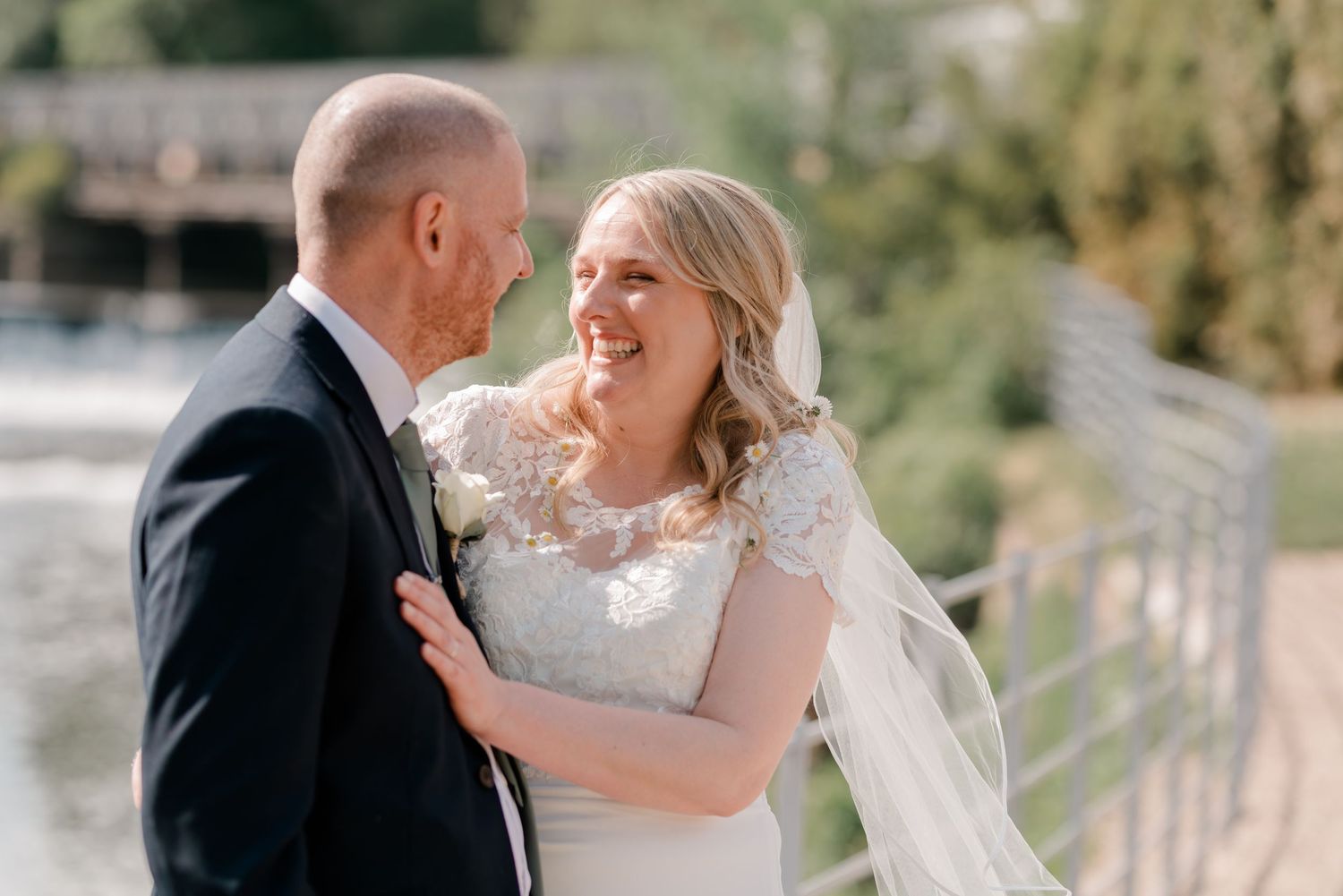 A romantic moment shared outdoors with a scenic backdrop.