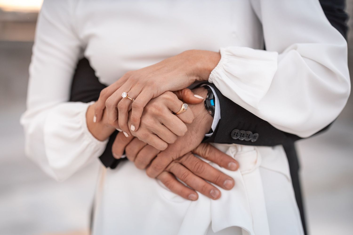 Wedding rings and hands