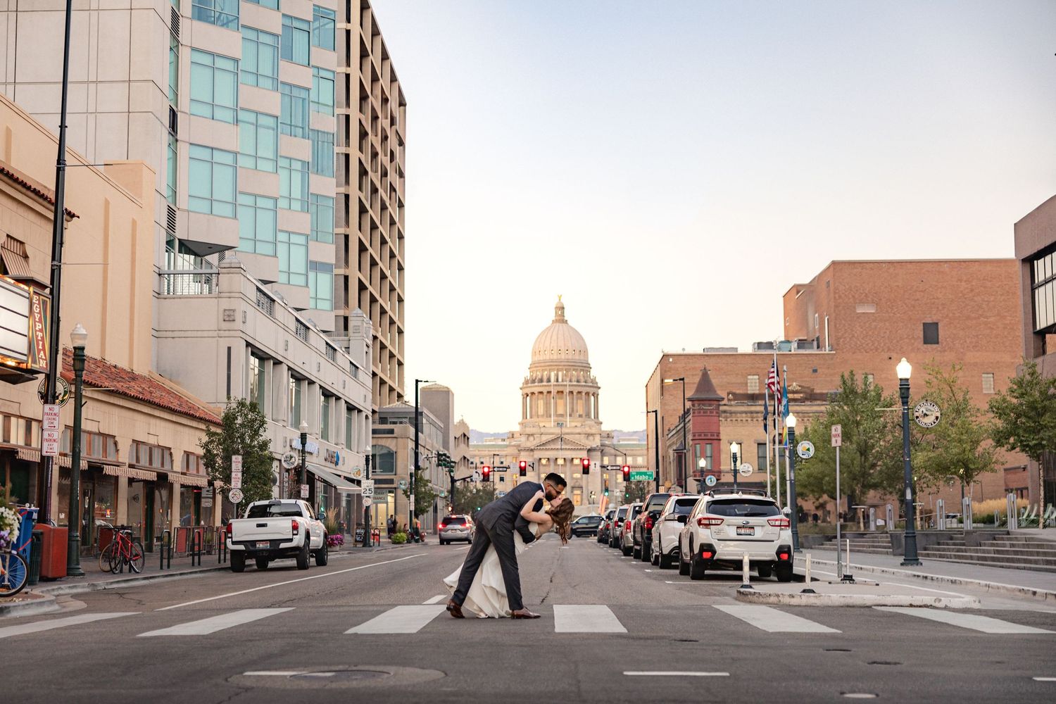 Urban cityscape wedding photos with state capitol building in background.