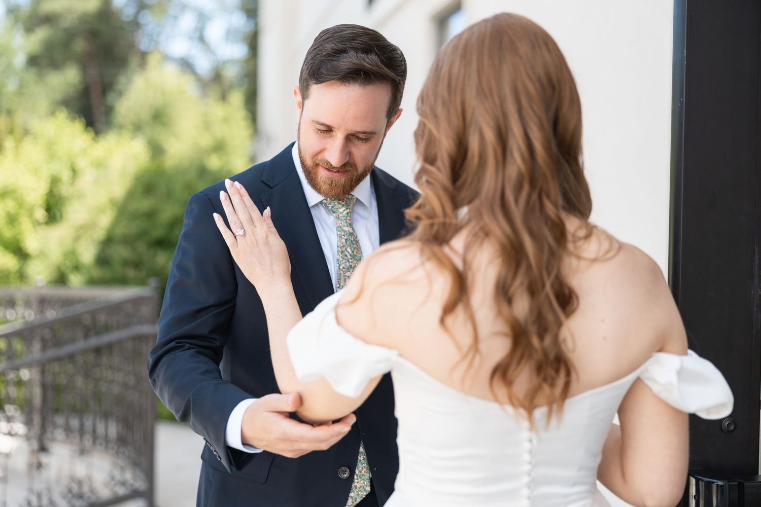 Wedding couple reacts emotionally during their first look moment.
