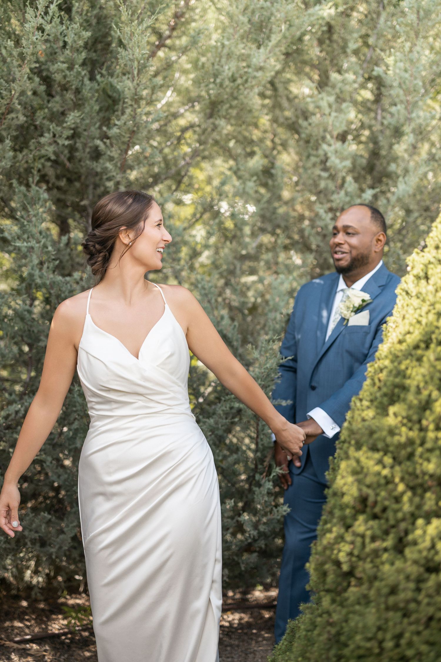 A playful sequence of wedding photos showing a couple dancing in a garden setting.