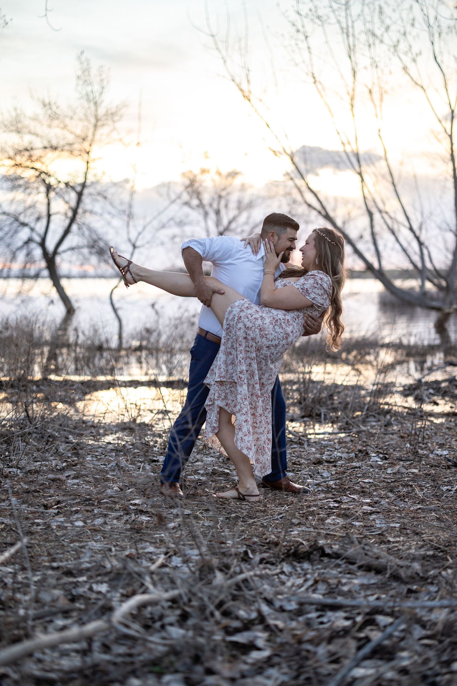 Playful dancing sequence captured near a lake at dusk.