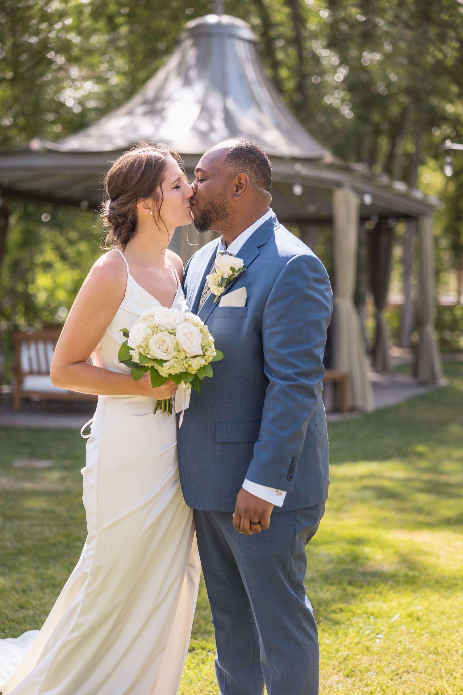 A romantic wedding photo sequence in a sun-dappled garden setting.