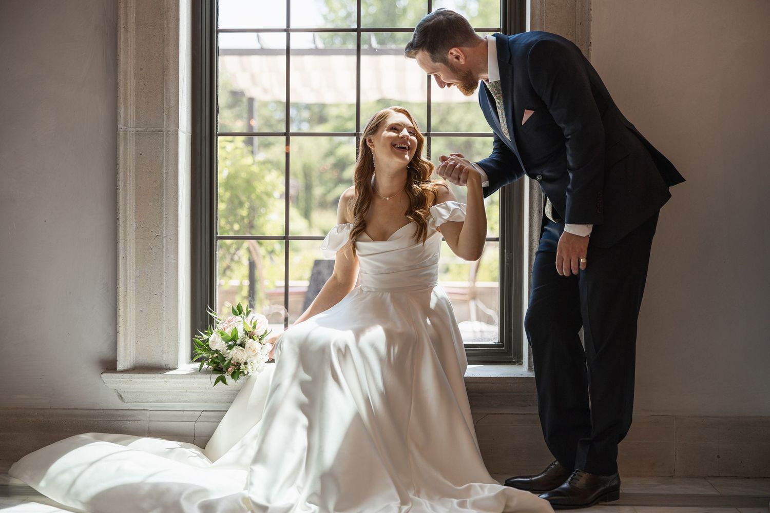 Series of candid wedding moments captured by arched windows in natural light.