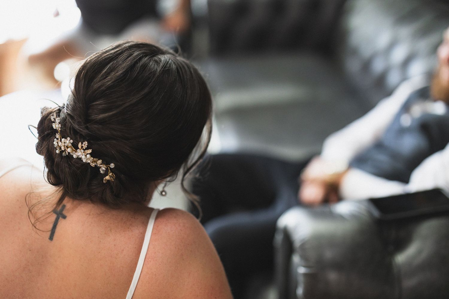 Close-up of elegant bridal hairstyle with decorative hair piece.