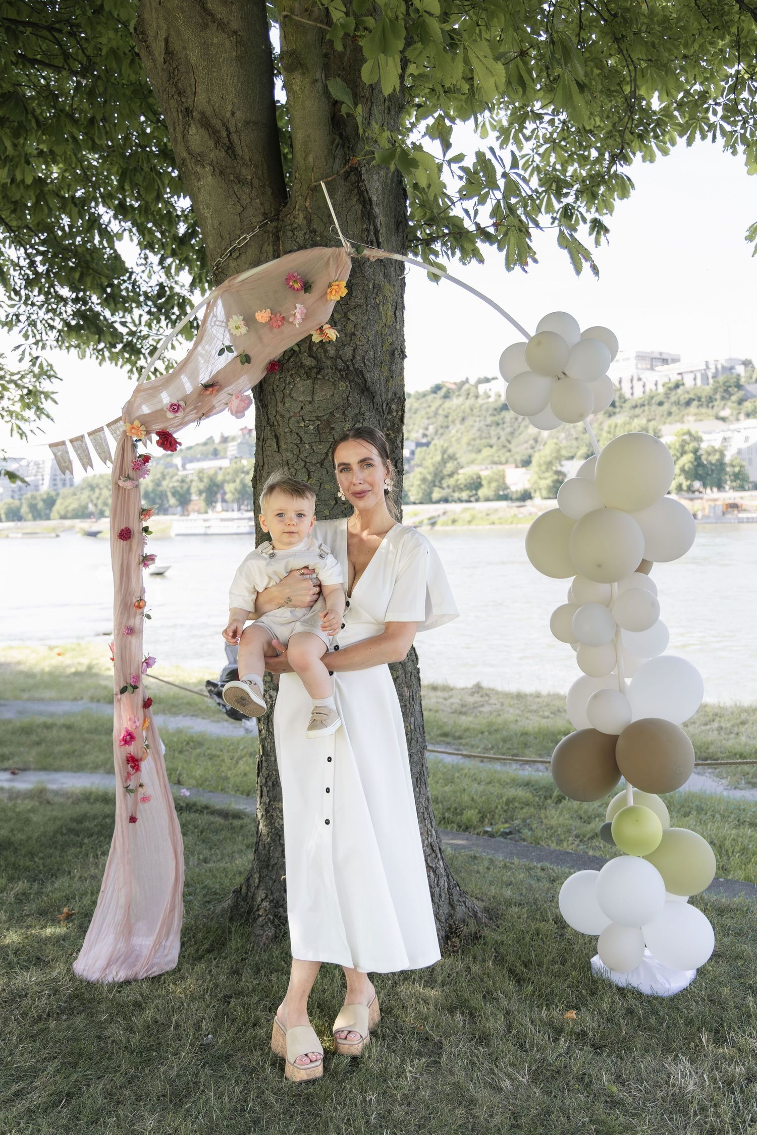 Mother and son celebrating a birthday together during a family birthday photoshoot.