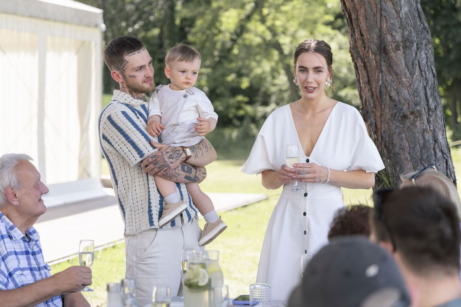 Mother giving a speech during her son’s birthday party.
