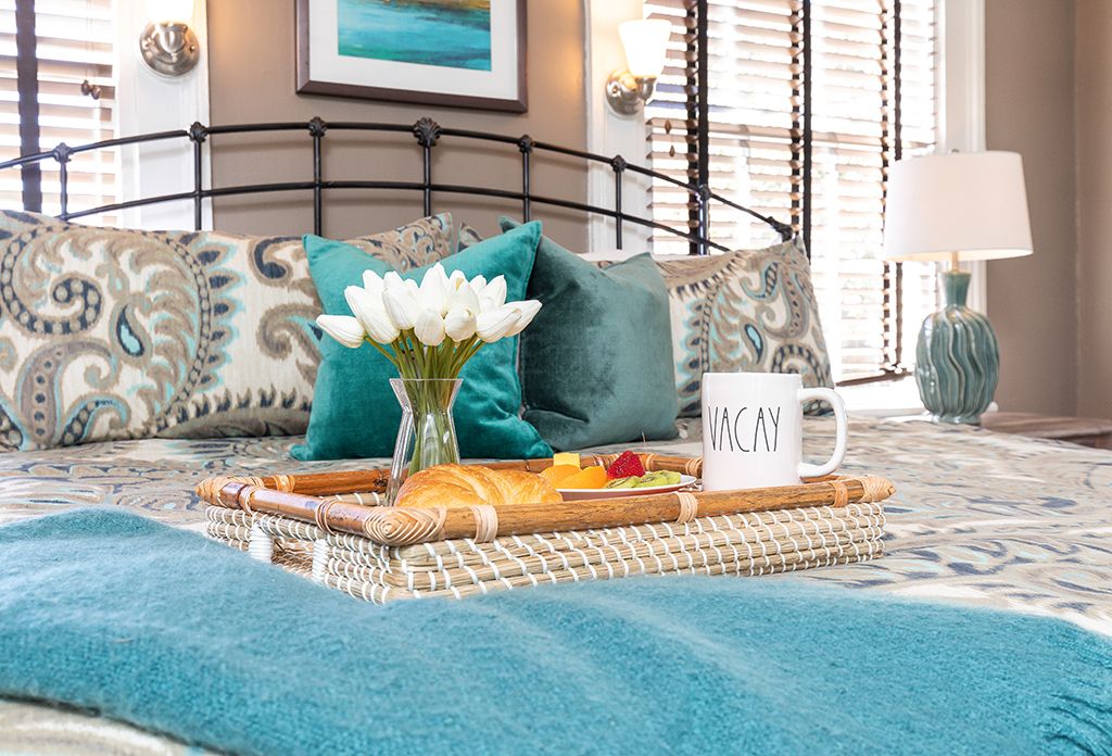A breakfast tray in a bedroom of a Savannah vacation rental