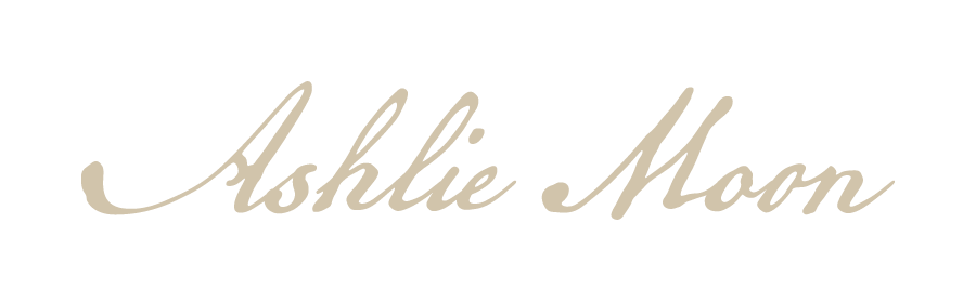 Ashlie Moon signature — ecosomatic photographer at Strange Birds Studio, Spartanburg, SC