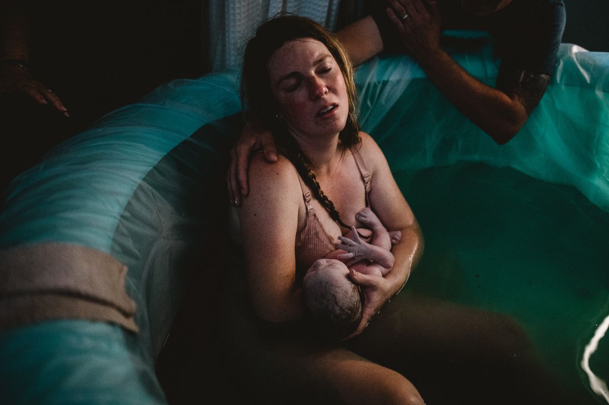 Raw, intimate, dark and moody birth photography near Spartanburg, SC.