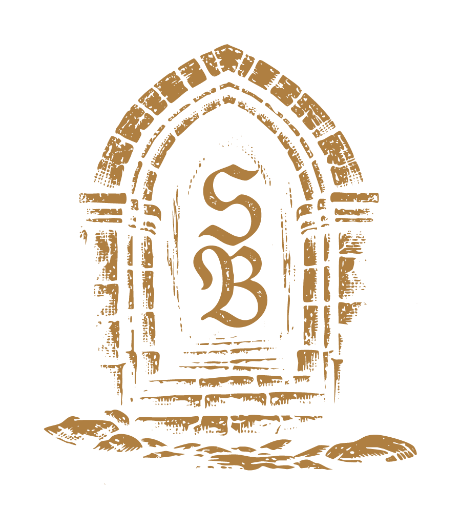 Strange Birds Studio monogram crest — ecosomatic boudoir photographer in Spartanburg, SC