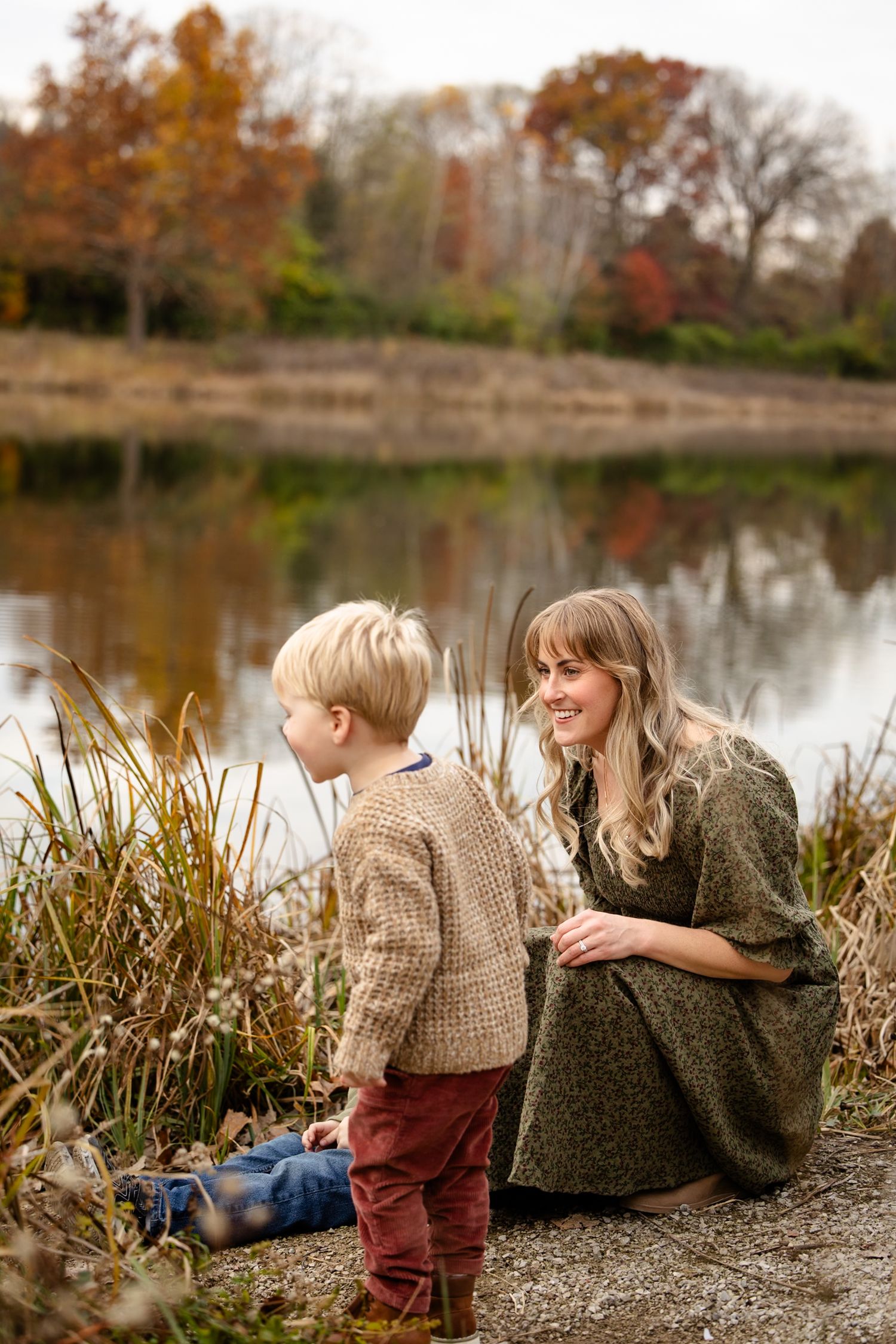 Mother and sons by pond during Avon, Indiana family photography session at Avon Town Hall Park.