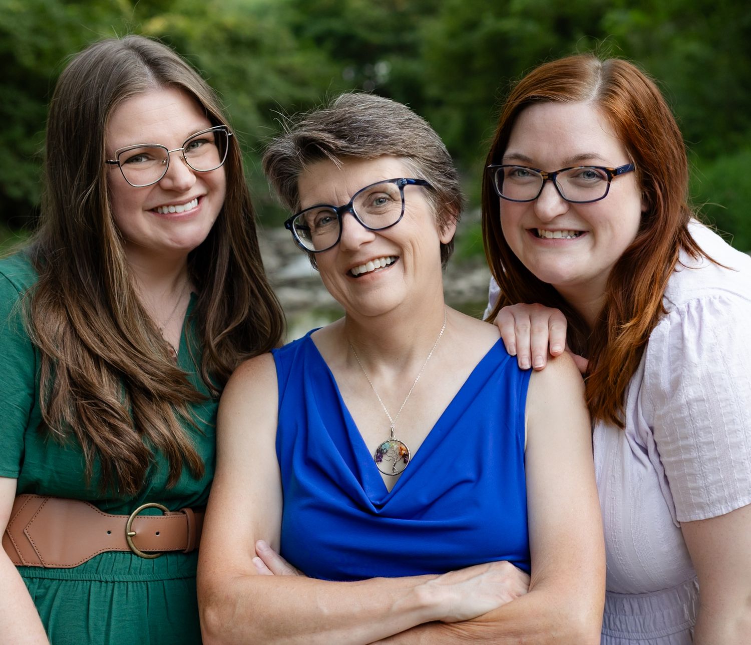 Group portrait of mother and daughter wearing casual outfits in an outdoor setting during family photos in Danville, Indiana.