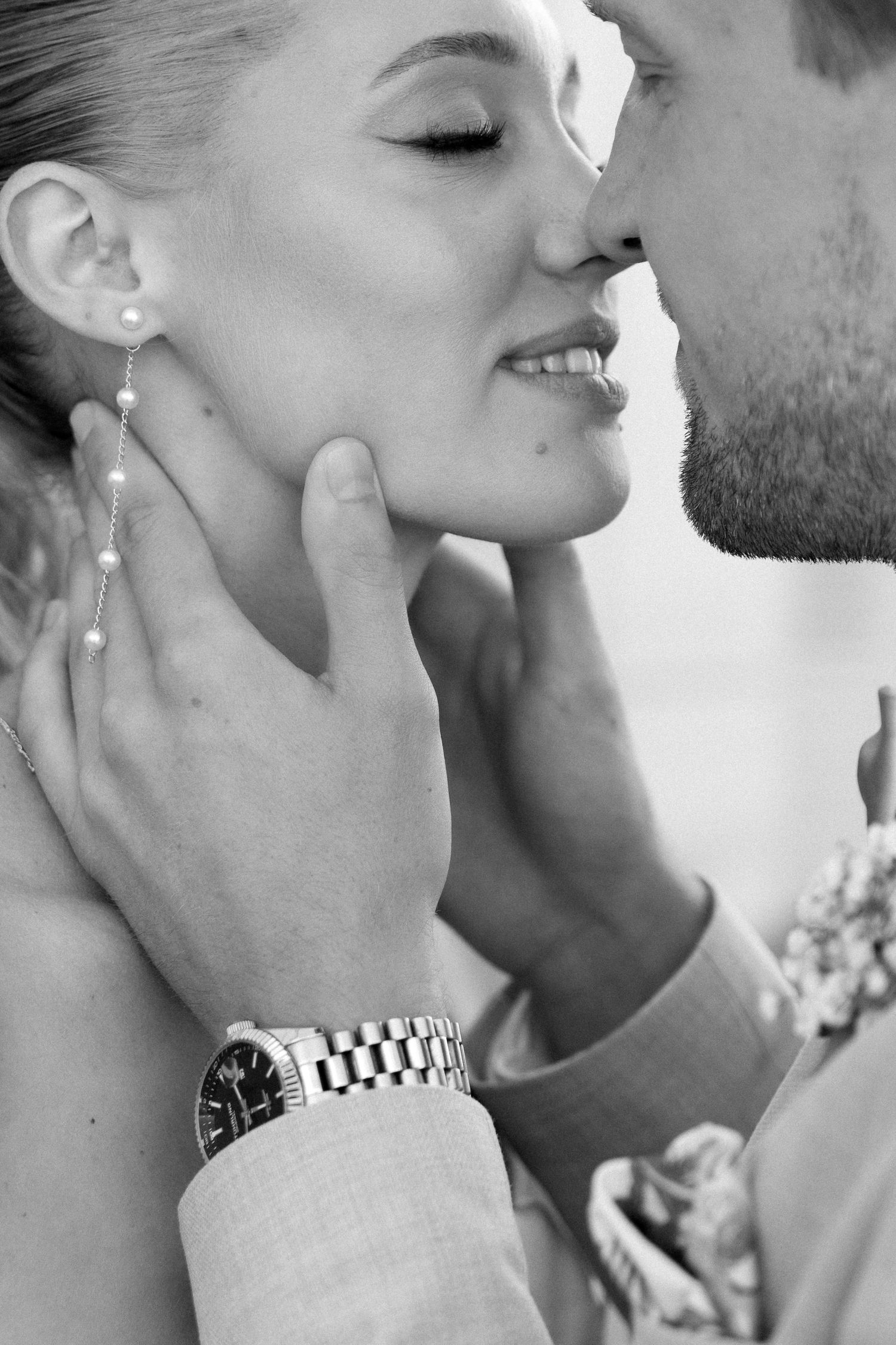 A romantic close-up sequence showing tender moments between a couple in black and white photography. Schloss Solitude
