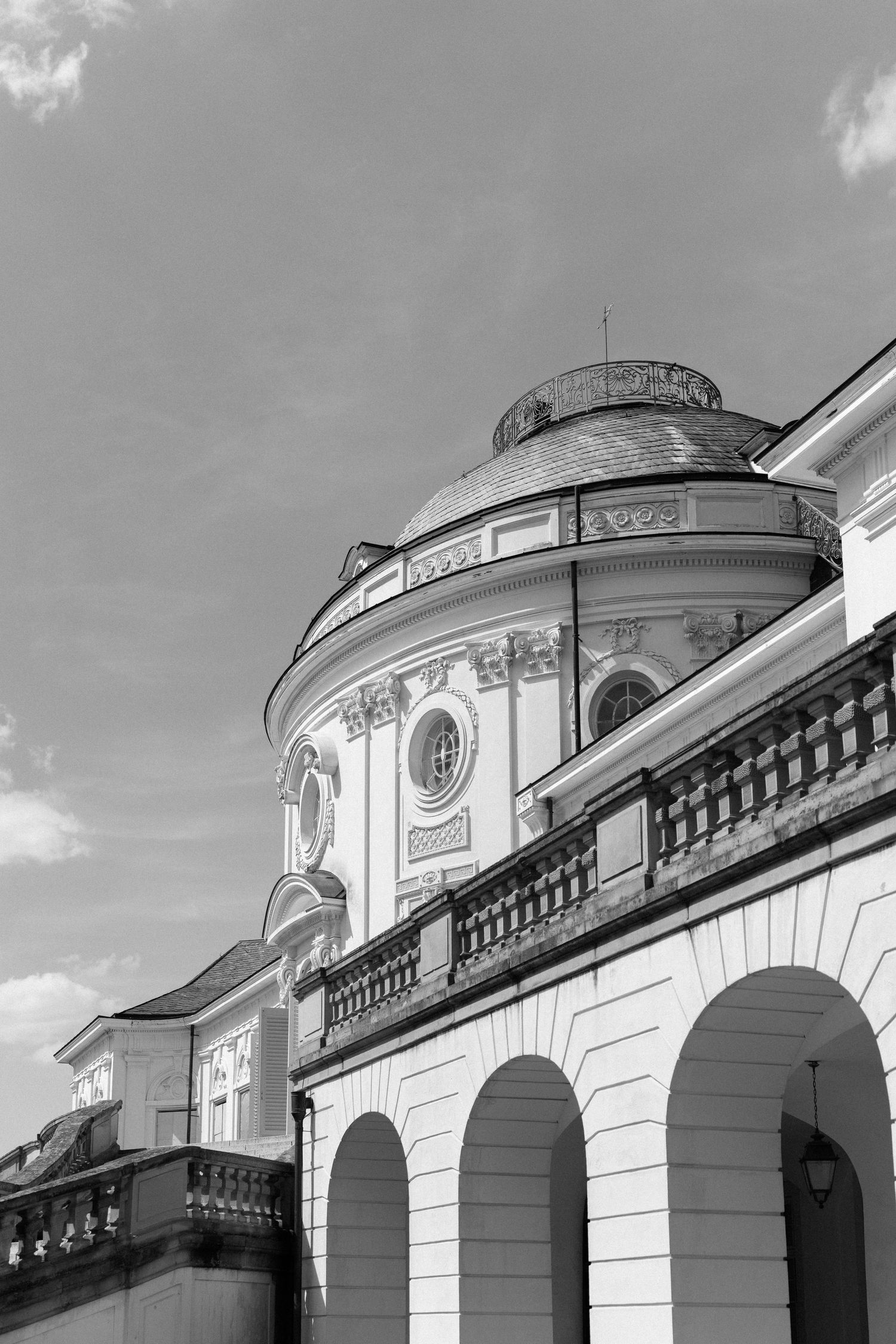 A sequence of architectural arches and domed structures in black and white showing classical building details. Schloss Solitude