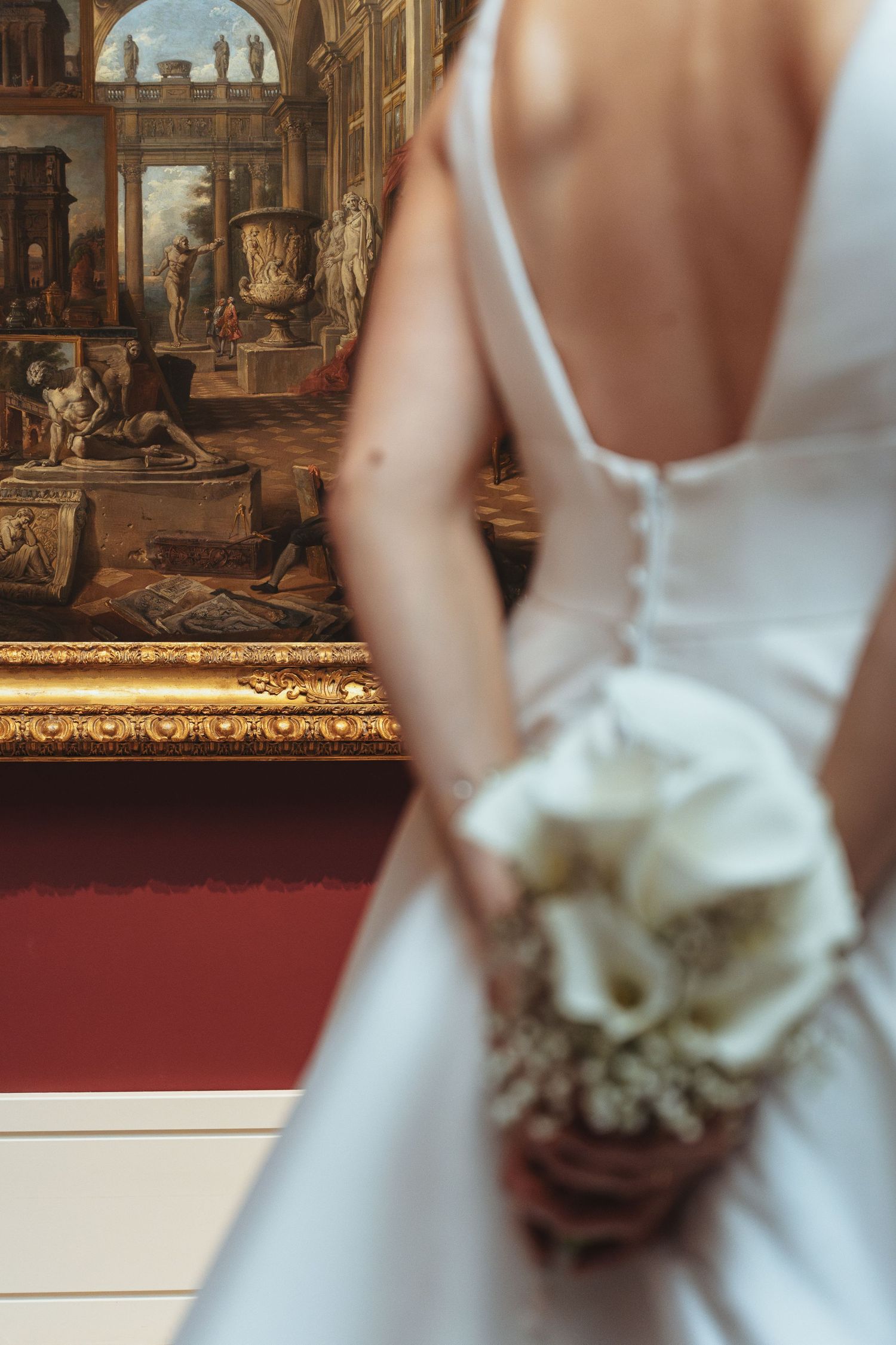 A series of cropped wedding dress photos showing white fabric details against a museum or gallery background.
