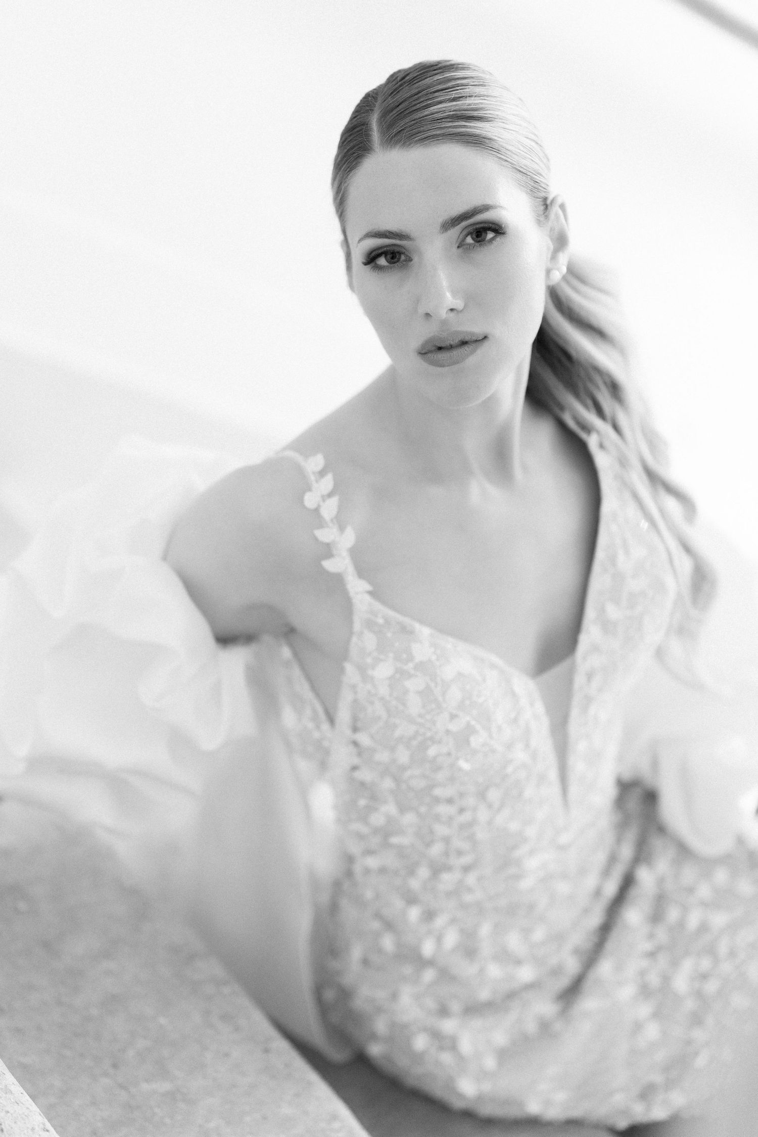A bride in a sparkling white wedding gown poses elegantly in a bright, ethereal setting with multiple poses shown. Wedding Verona