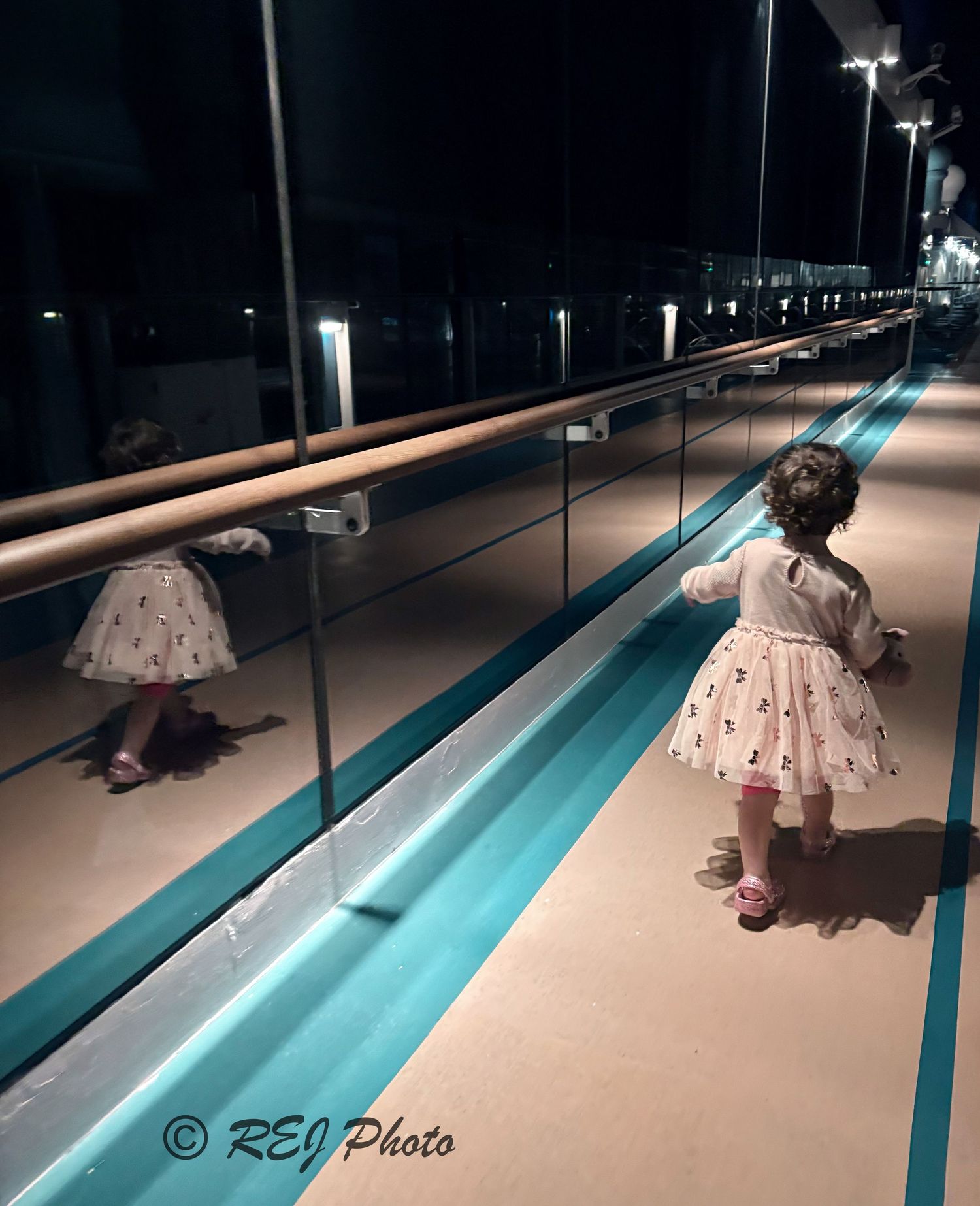 My daughter running away with my heart on our cruise.