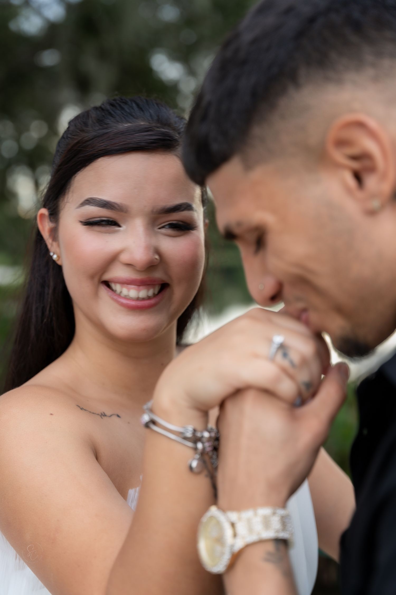 Intimate close-up shots showing smiles and tender moments in formal attire.