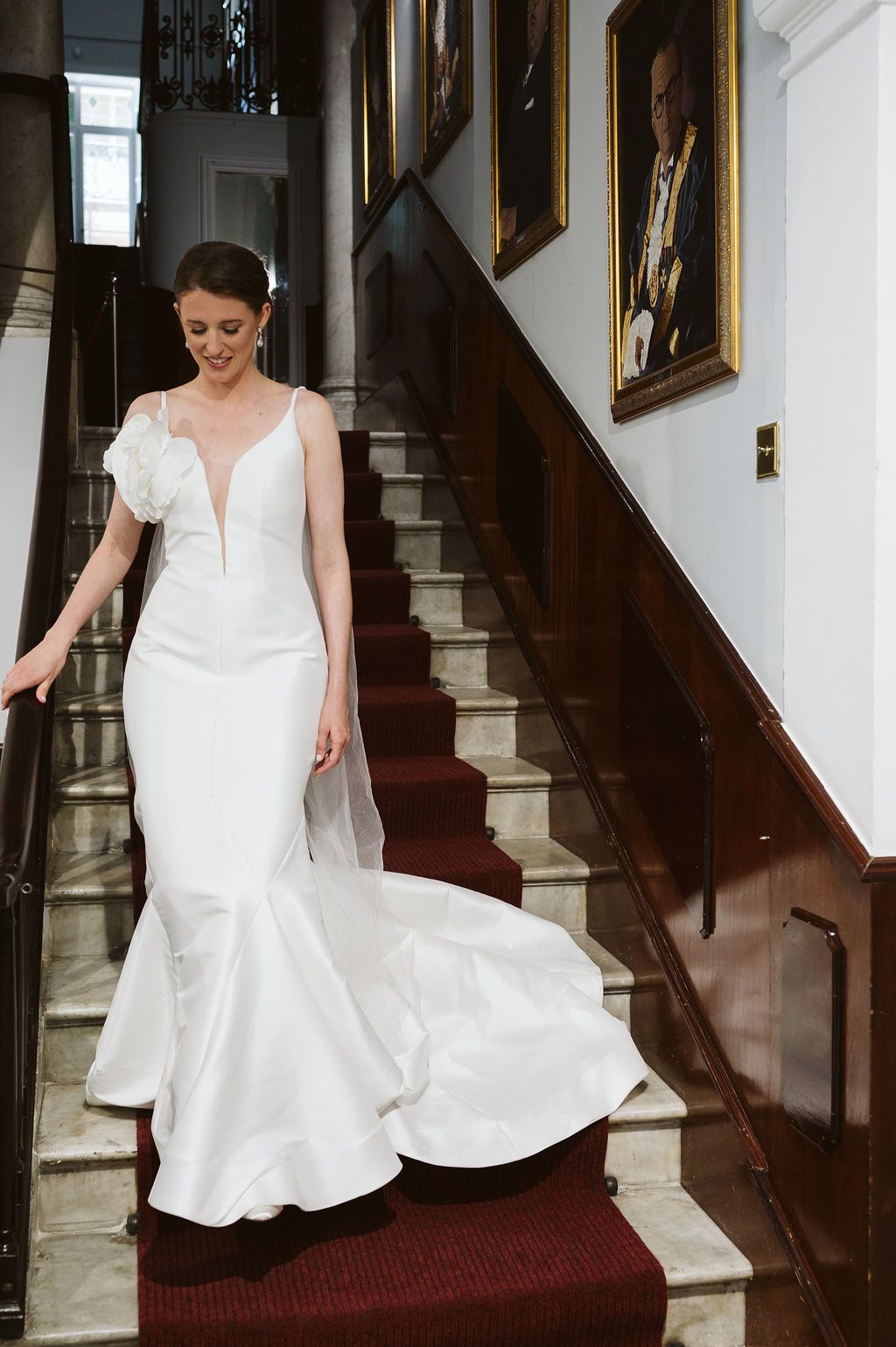 |Bride posing on stairs in Registry Office in Gibraltar