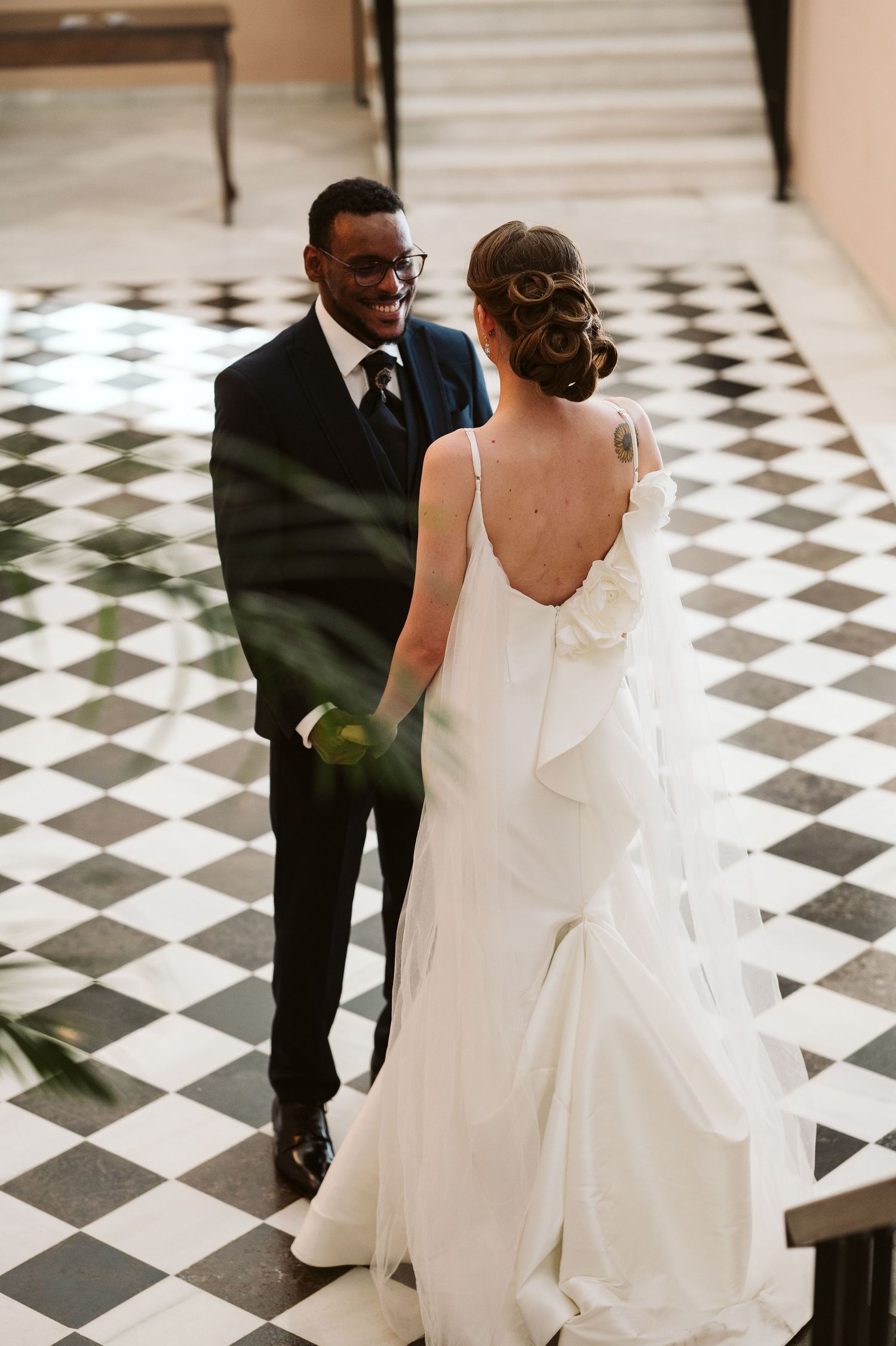 Bride and groom at the Rock hotel holding hands