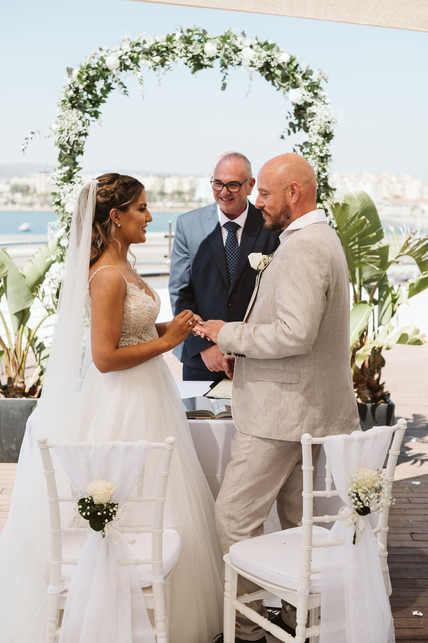 Exchanging rings on Sunborn Hotel deck