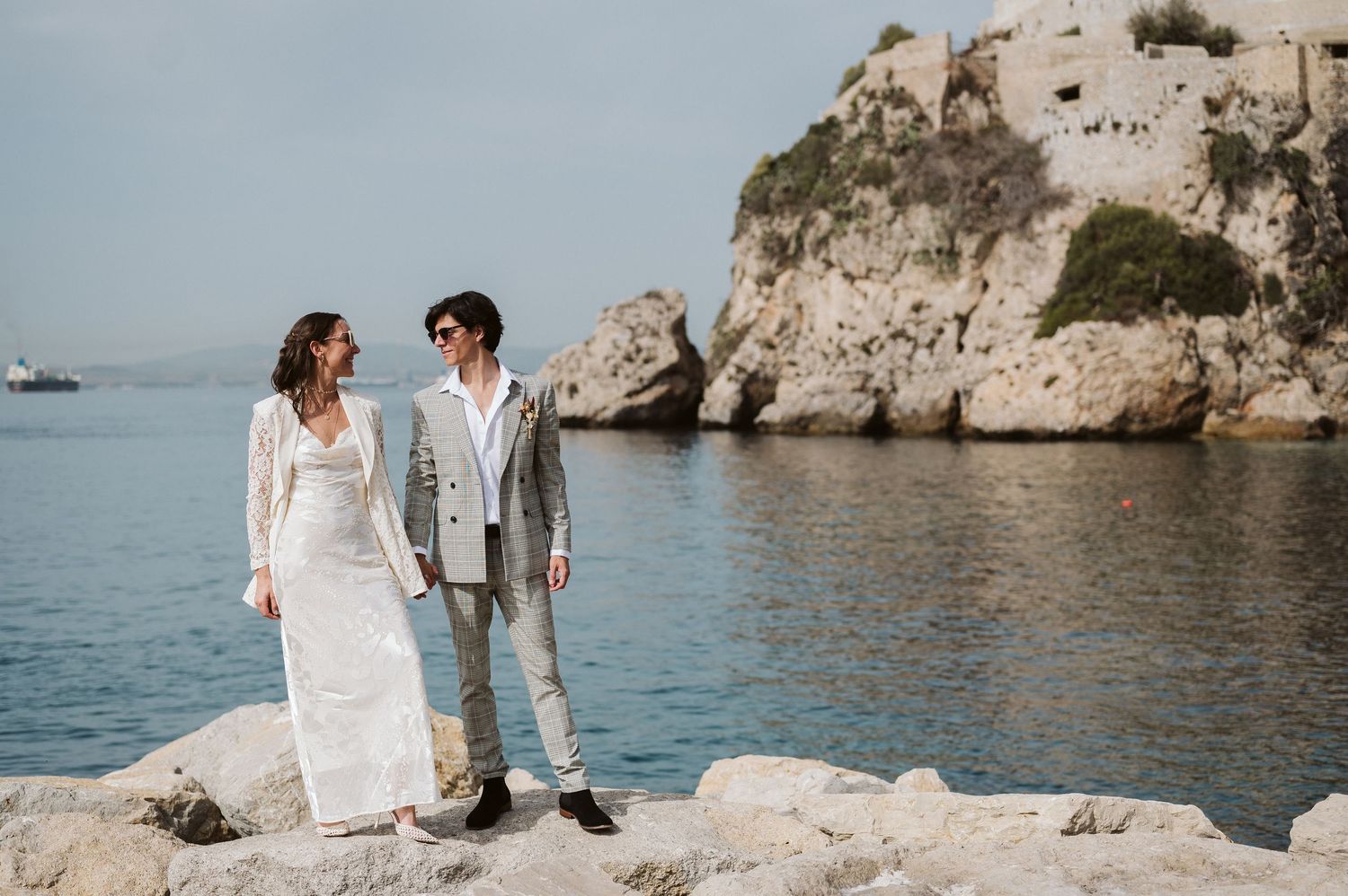 groom looking at the bride smiling at the Camp Bay