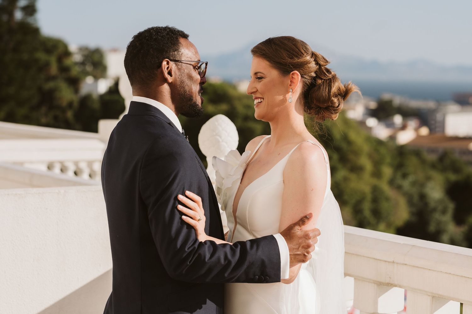 Wedding couple with the beautiful view from the Rock Hotel