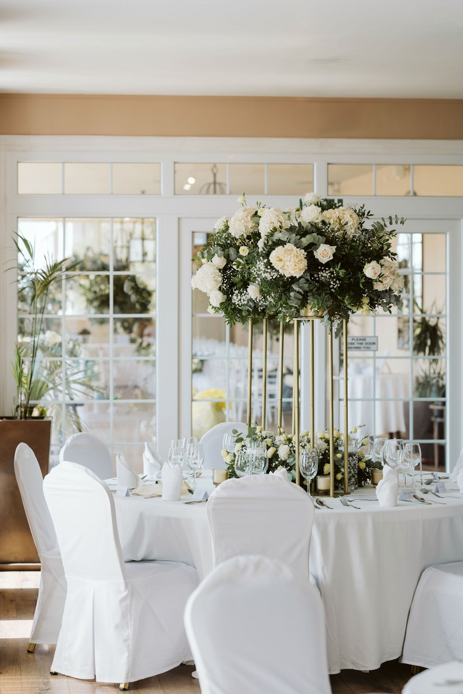 Elegant wedding aisle setup at Rock Hotel terrace venue