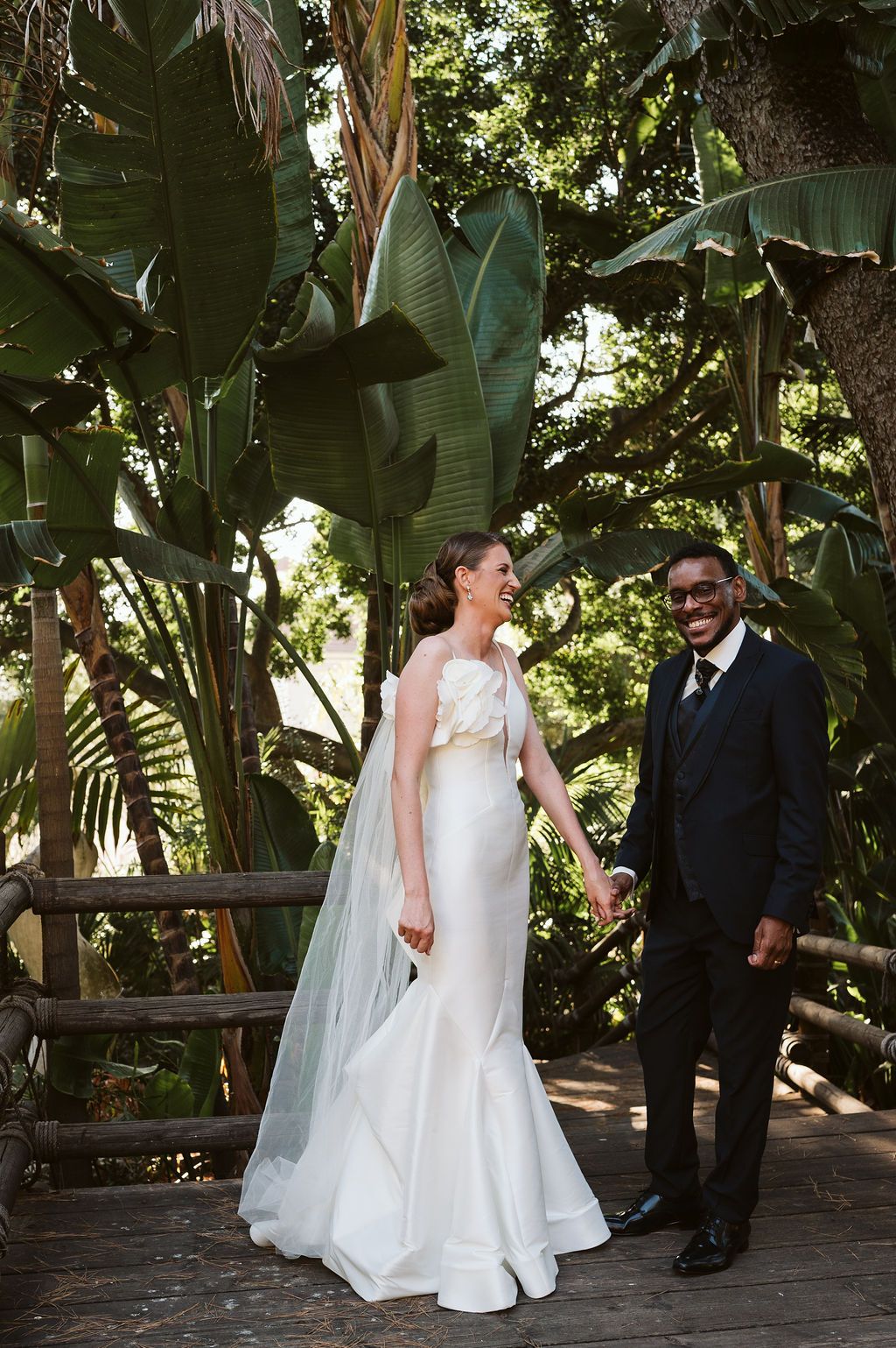 bride and groom laughing at the Alameda Gardens