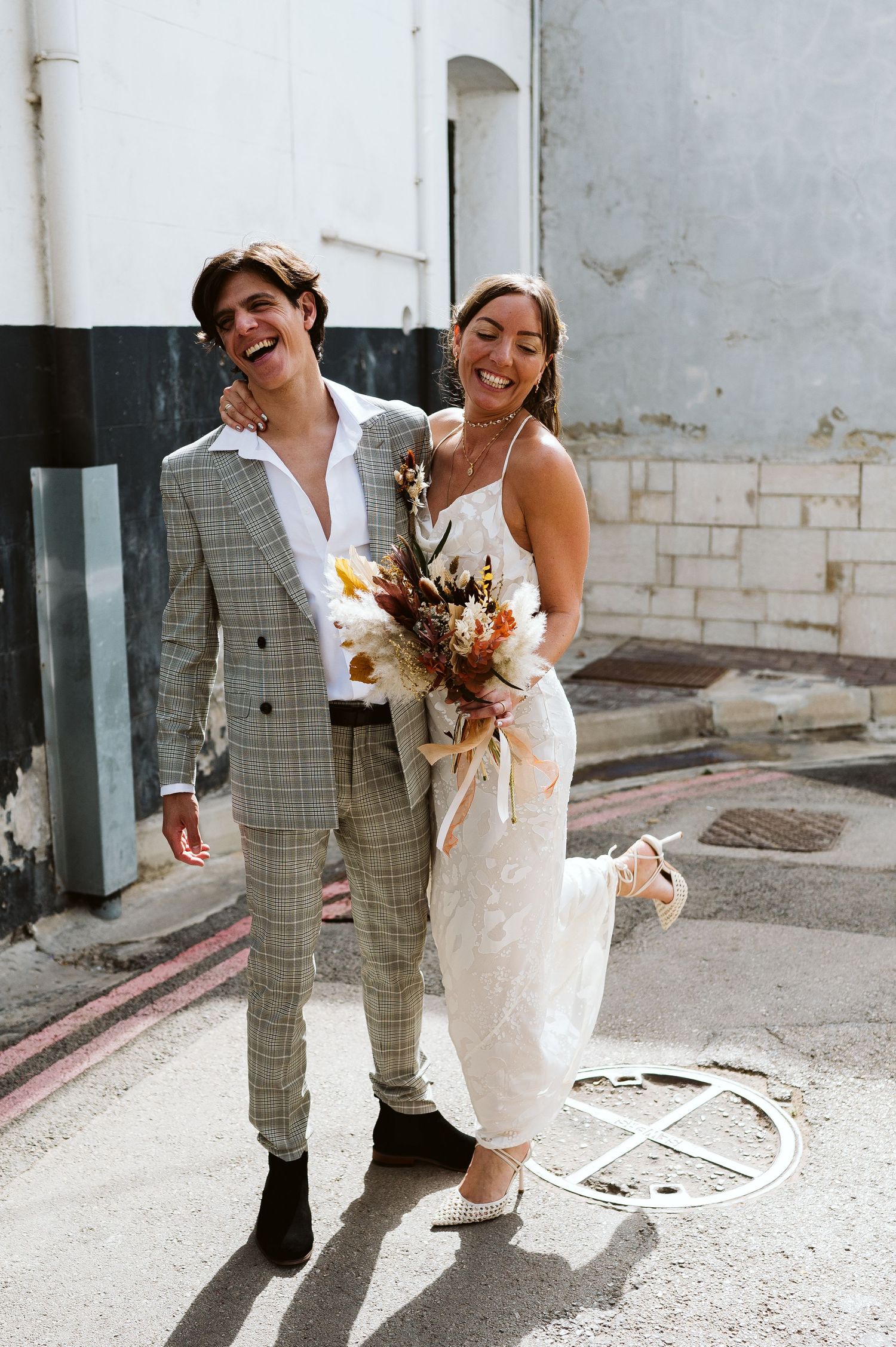 bride and groom cool pose for a nice photo
