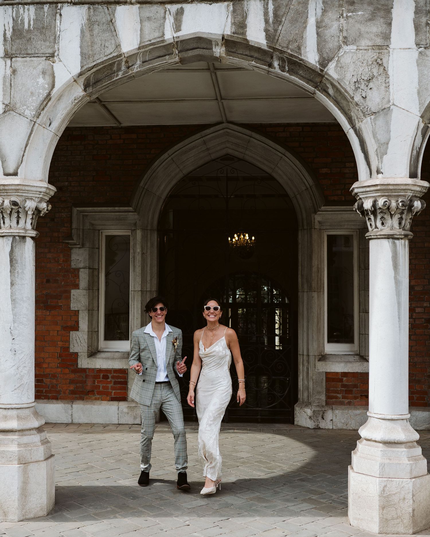 bride and groom cool photo in front of the Convent in Gibraltar