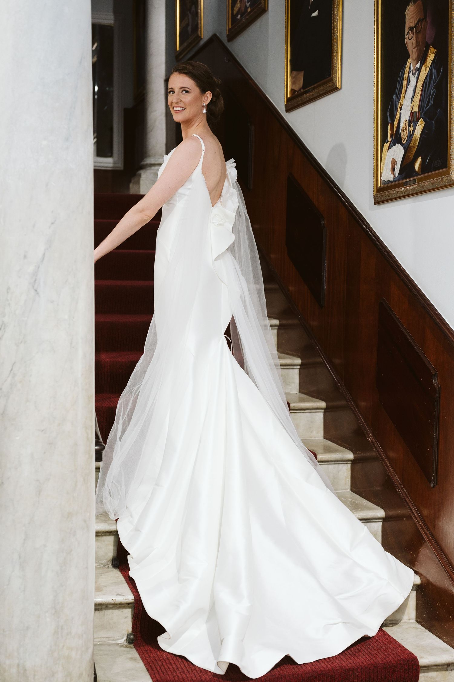 Bride stranding on the stairs at the Registry Office of Gibraltar